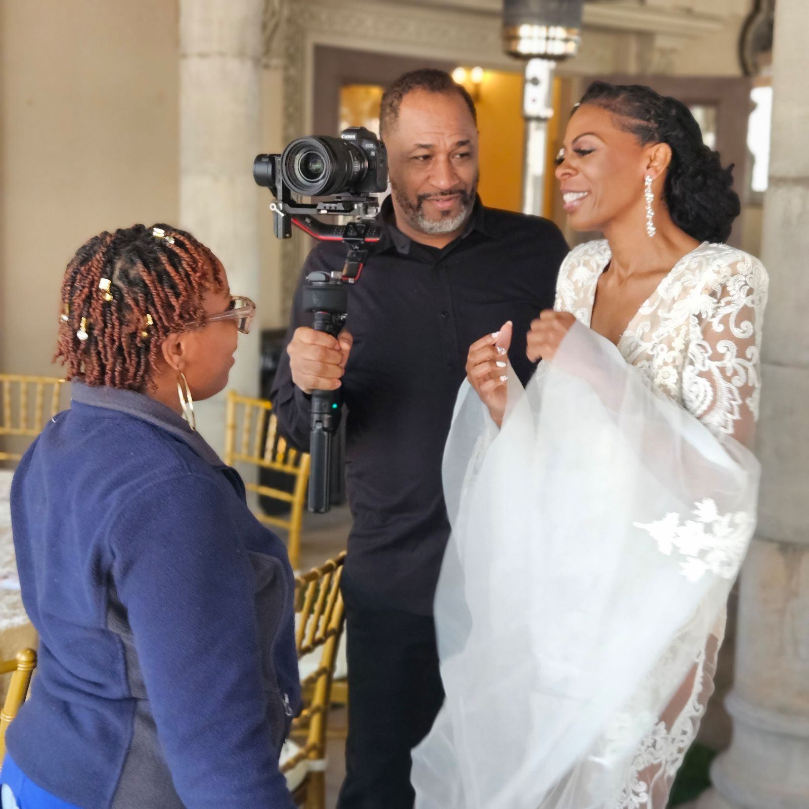 Wedding planner discussing wedding details with bride and groom