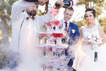 Custom cocktail garnish station featuring fresh herbs and edible flowers – Personalized drink stations elevating the cocktail experience at a luxury wedding.