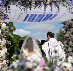 Bride and groom sharing their first dance at a luxurious Jewish wedding reception in Atlanta.
