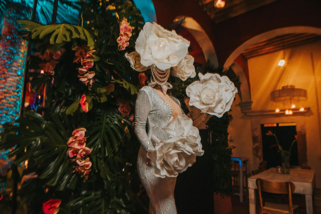 Floral designer crafting a stunning bridal bouquet, highlighting unique blooms and colors.
